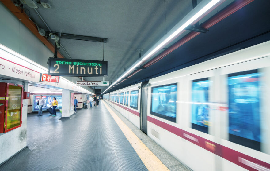 ROME - MAY 17, 2014: Commuter train at city subway station. More than 15 million people visit the city every year. — Photo by jovannig - Depositphotos